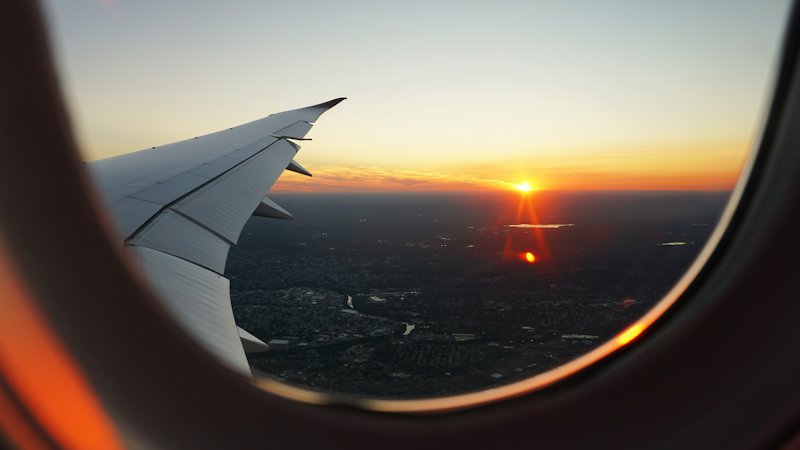 A sunset seen from an aircraft window